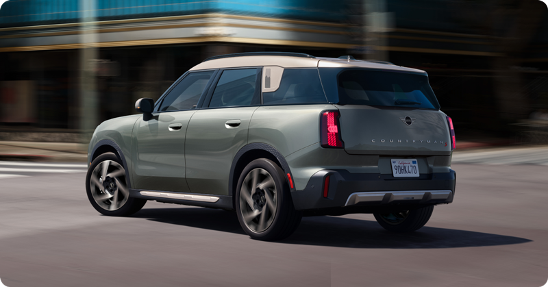 Angled rear view of the MINI Countryman S ALL4 driving.