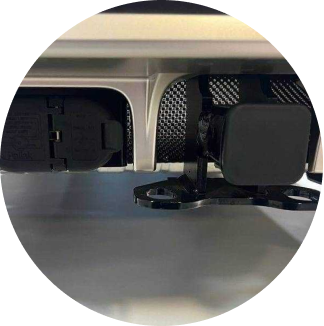 A close-up of the headlight on the MINI Countryman SE ALL4. 